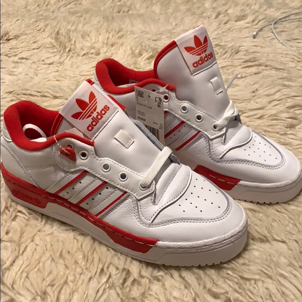 SOLD Adidas red and white rivalry low top